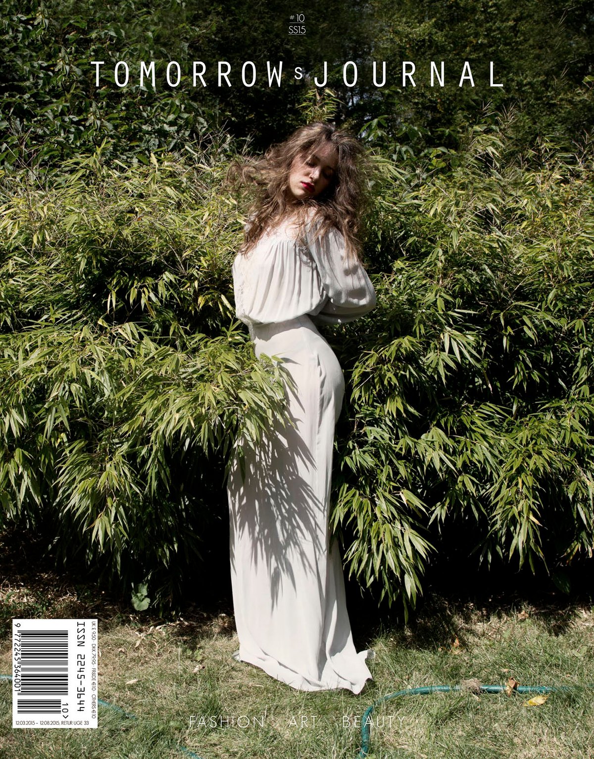 Tomorrow’s Journal issue 10 cover: a woman in a pale gown in front of green bamboo